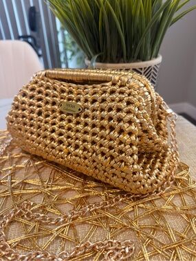 Gold crochet bag designer